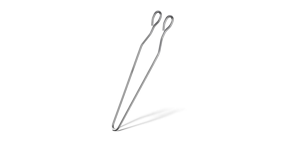 Part made using a twin-head, twin-turret wire bending machine. 